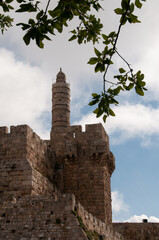 Afternoon view of the landmark, stone Tower of David minaret as golden sunlight strikes the ancient walls of the Old City of Jerusalem. © Yehoshua Halevi