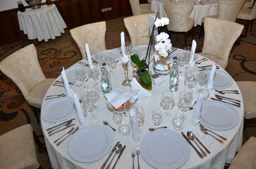 round table in the restaurant on the wedding day, in Romania