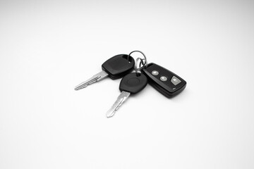 Car keys on white background