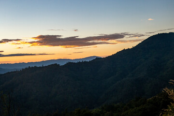 View of hill and sunset