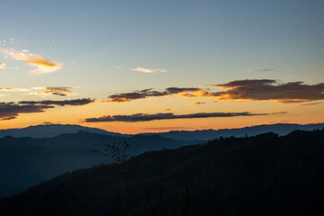 View of hill and sunset