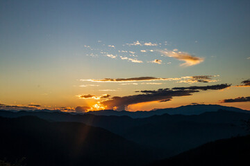 View of hill and sunset
