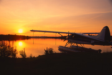 Float plane on Lake Hood at sunset, Anchorage, Alaska, USA