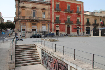 Fototapeta na wymiar flat buildings and matteotti square in ragusa in sicily (italy)