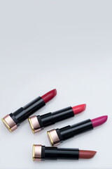 red lipstick on white background