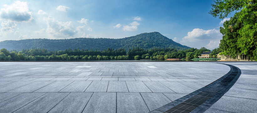 Empty square platform and green mountain with forest landscape in Hangzhou, China.