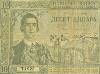 Detail of 10 dinars banknote printed by Yugoslavia in 1939, that shows portrait of King Peter II...