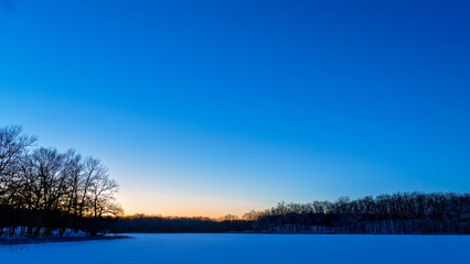 Winter sunset over Haven Hill Lake, Haven Hill Natural Area, Highland Recreation Area, Oakland County, Michigan