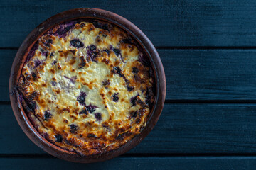 Cottage cheese casserole baked with blueberry, close up. Curd casserole with berries