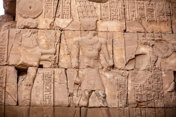 Different hieroglyphs on the walls and columns in the Karnak temple. Karnak temple is the largest...