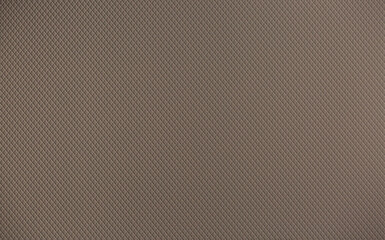 Brown background from decorative plaster with abstract spots. Unusual beige wall texture with beautiful patterns, creative surface background. Front covering for facing of buildings.