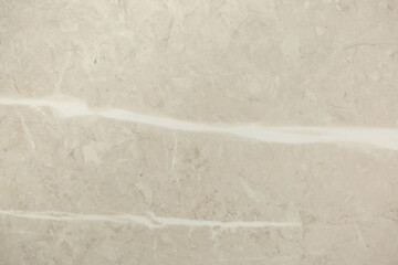 Brown background from decorative plaster with abstract spots. Unusual beige wall texture with beautiful patterns, creative surface background. Front covering for facing of buildings.