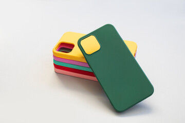 Cases set for smartphone on grey background. Silicone protection for mobile phone. Colorful...