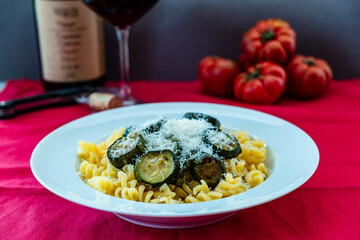 Italian food: pasta with zucchini and parmesan