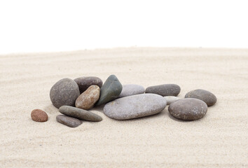 Fototapeta na wymiar Pile of sand with sea stones.