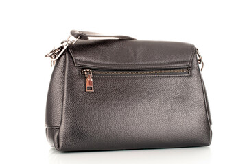 One handbag made of artificial leather, close-up, isolated on a white background.