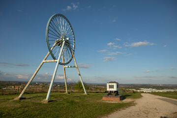 Newcastle-under-Lyme, Staffordshire, uk, 04,25.2022,Apedale pit wheel memorial and coal tub located...