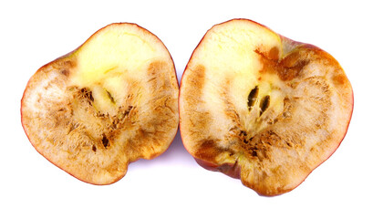 Halved rotten apple is isolated against a white background. Full clipping path.