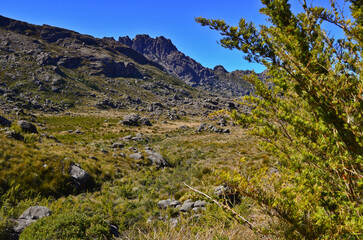 Agulhas Negras (2.791m), or Black Needles peak, one of the highest in Brazil, towering above the boulder-filled high plateau of Itatiaia National Park, Itatiaia, Rio de Janeiro, Brazil