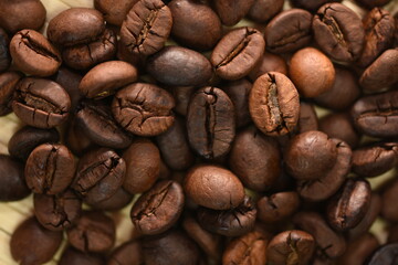 coffee beans in  a small wicker basket