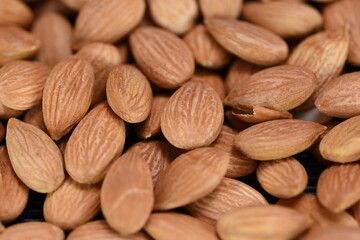 Production and consumption proccess of almonds. raw green,  raw dried and roasted almondsin