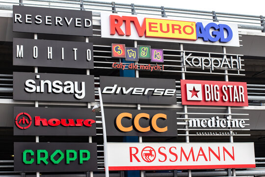 Poland, Bydgoszcz - February 15, 2022: Signboards of famous brands of shops. Facade of the shopping center