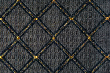 Fototapeta premium yellow-black fabric with rhombuses background for design