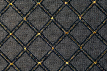 Fototapeta premium yellow-black fabric with rhombuses background for design