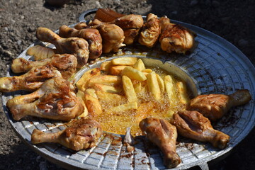 crispy chicken and fried potatoes