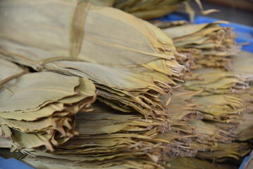 Dried Ruo leaves used to wrap rice dumpling on dragon boat festival. Traditional Chinese food natural wrapping materials.