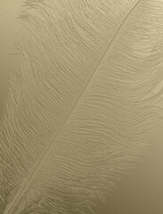 Golden embossed Ostrich Feather shimmering background - subtle gold coloured highly detailed single flat Ostrich feather with a slightly embossed effect
