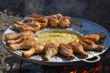 crispy chicken thighs  and fried potatoes