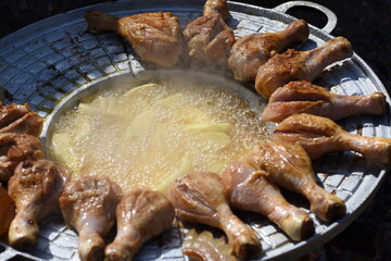 crispy chicken thighs  and fried potatoes