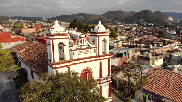 Aerial Drone shot of Church Iglesia de San Cristobalito on the mountain in San Cristobal de Las Casas, Chiapas, Mexico