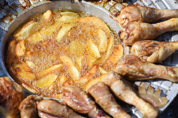 crispy chicken and fried potatoes