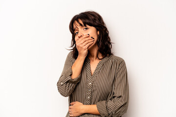 Young hispanic woman isolated on white background scared and afraid.