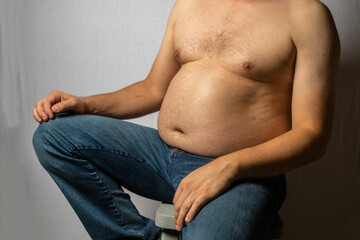 A Studio Photograph of An Overweight Caucasian Man
