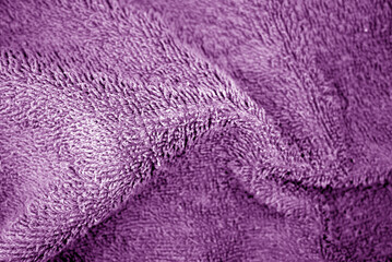 Bath towel texture in purple tone.