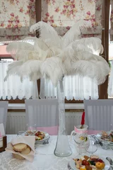 Zelfklevend Fotobehang White ostrich feather ,white feathers, wedding decoration theme © Laurenx