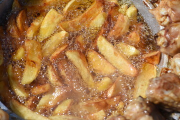 crispy chicken and fried potatoes