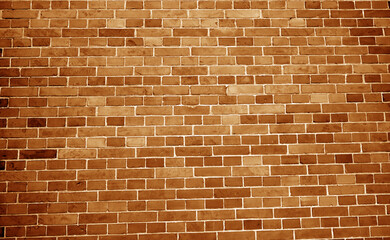 Pattern of brick wall in orange tone.