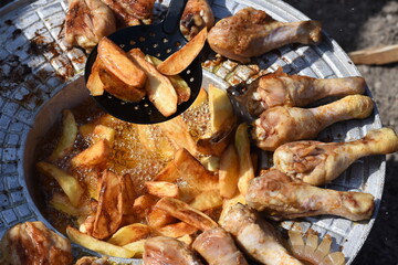 crispy chicken and fried potatoes