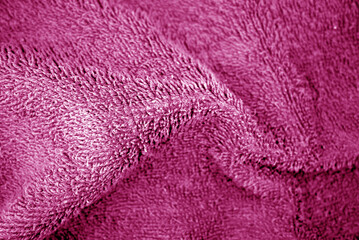 Bath towel texture in pink tone.