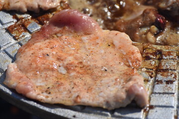pork steak meat on bbq grill pan, home made
