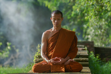 Buddhist monks meditate to calm the mind. The brain will refresh the secretion of Indoine. Make...