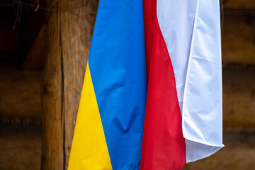 The flag of Poland and Ukraine waving together as a symbol of opposition to Russian aggression.
