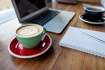 cup of coffee and laptop