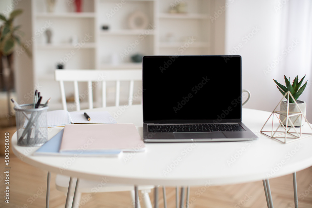 Poster Laptop Computer With Empty Screen Standing On Table At Home