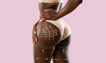 Cropped of black woman in underwear showing buttocks