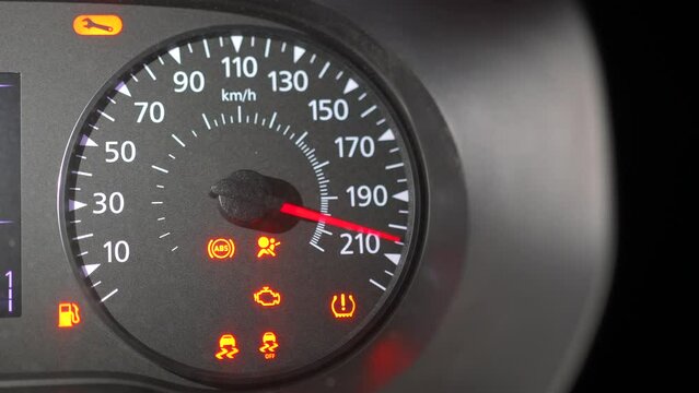 Arrow speedometer of car in start. Driver start engine. Check sensors before driving. security. Night rider.